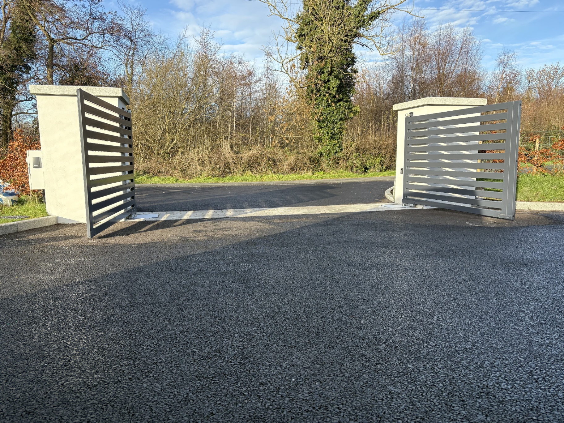 Twin leaf slat gates open